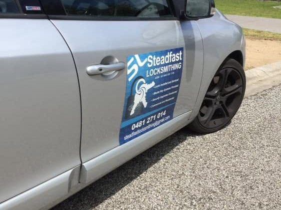 Steadfast Locksmithing branded work car