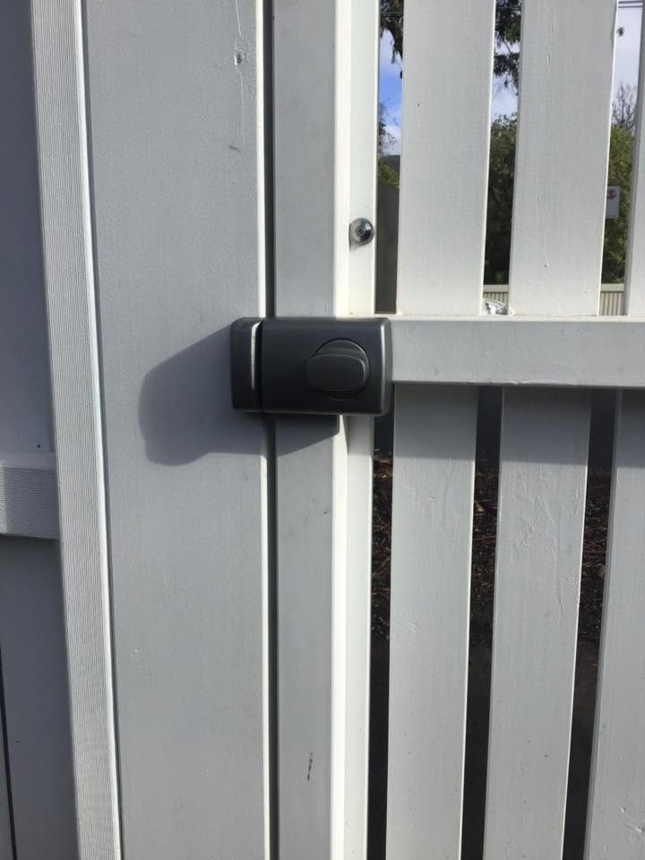 Keyless lock fitted to a metal slat gate